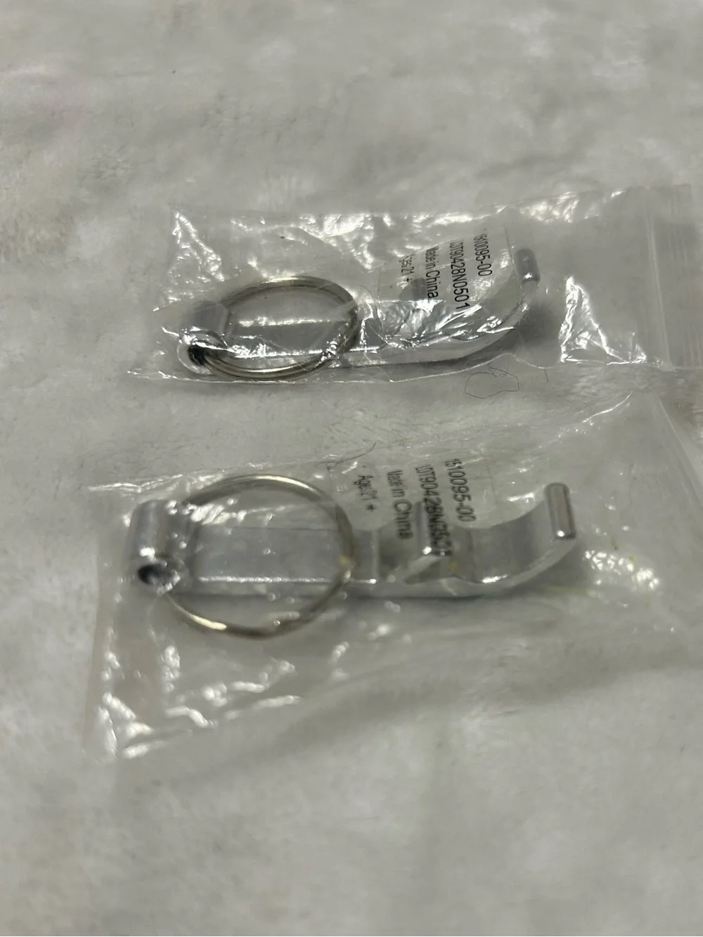 2 metal keychain bottle openers